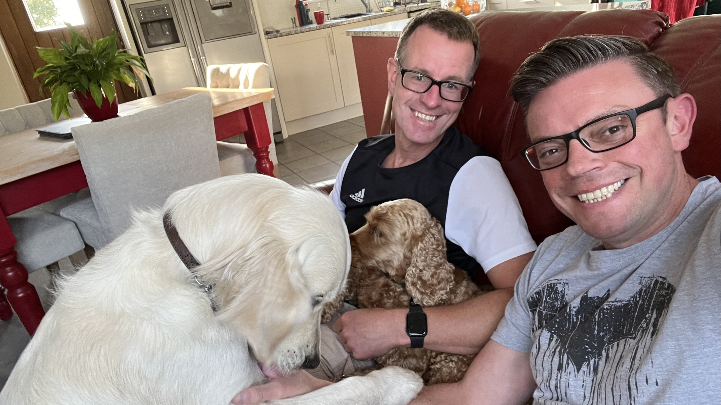 Mark and Stu from Paws & Pixels relaxing at home with their dogs